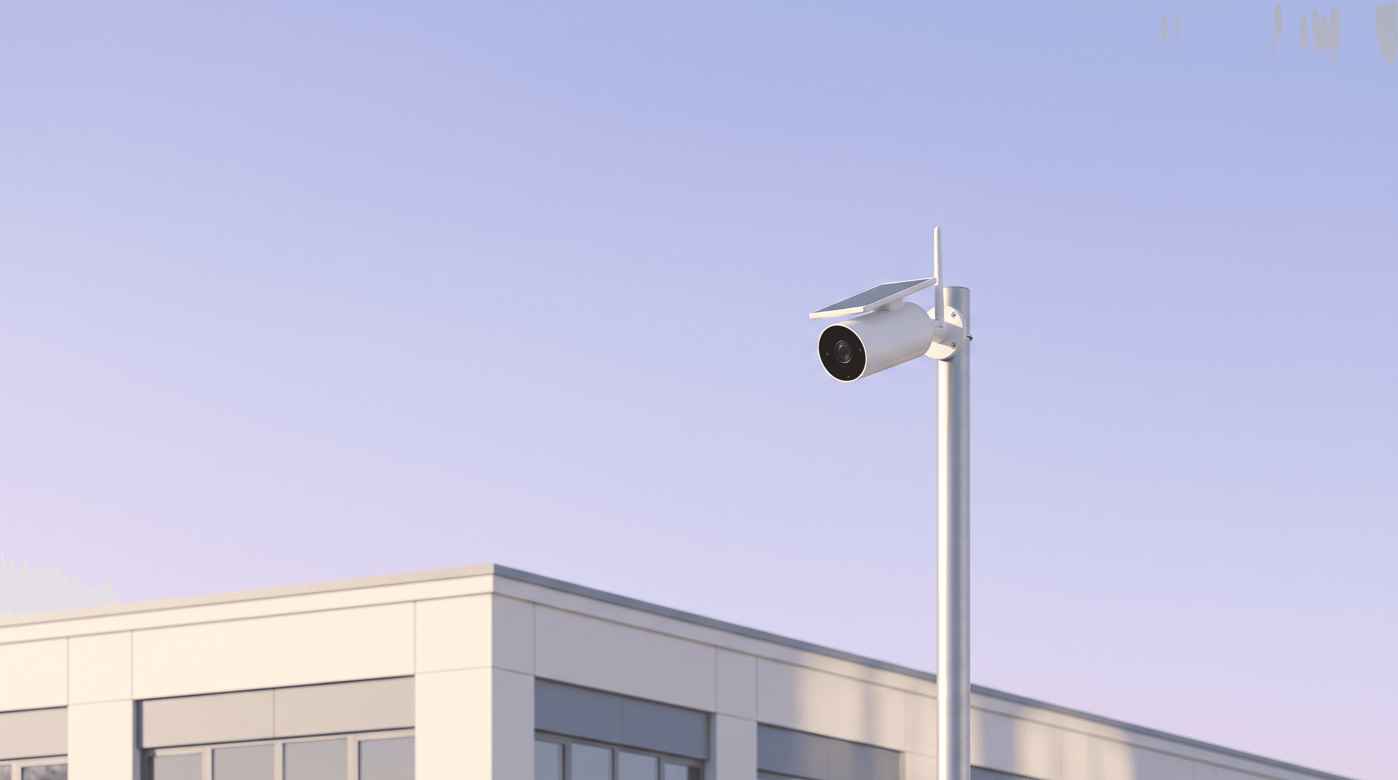 A white solar-powered security camera on a slim pole against a pale morning sky